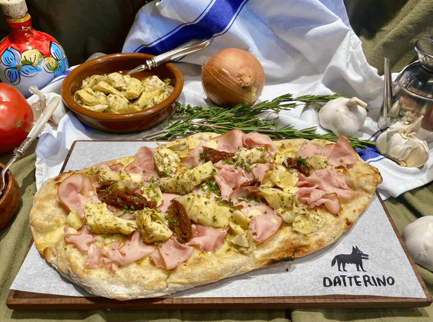 Pinsa Romana with ham and artichokes